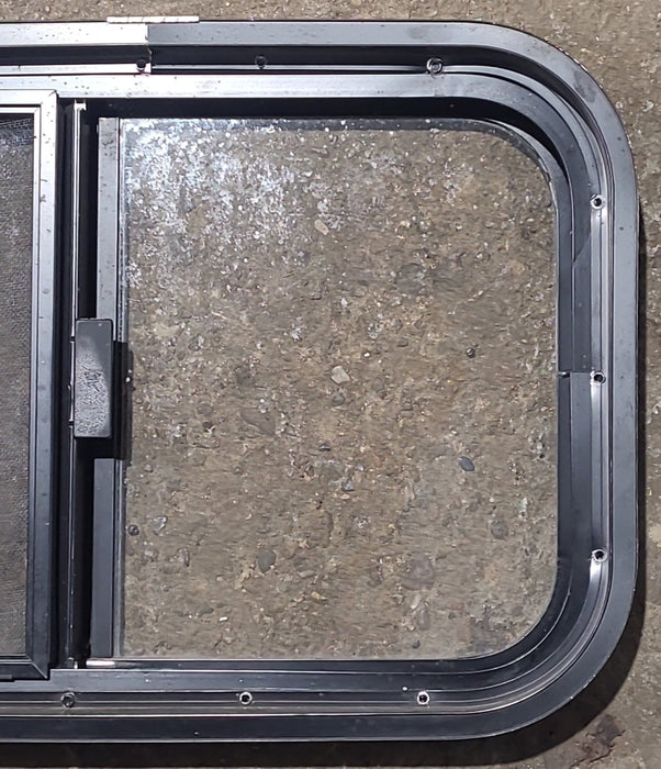 Used Black Radius Opening Window : 23 1/2" W x 14 1/2" H x 1 5/8" D