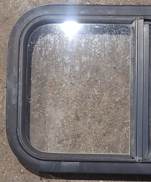 Used Black Radius Opening Window : 23 1/2" W x 14 1/2" H x 1 5/8" D