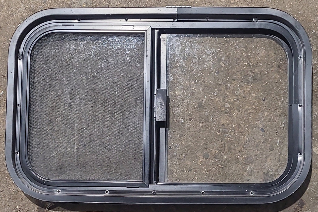 Used Black Radius Opening Window : 23 1/2" W x 14 1/2" H x 1 5/8" D