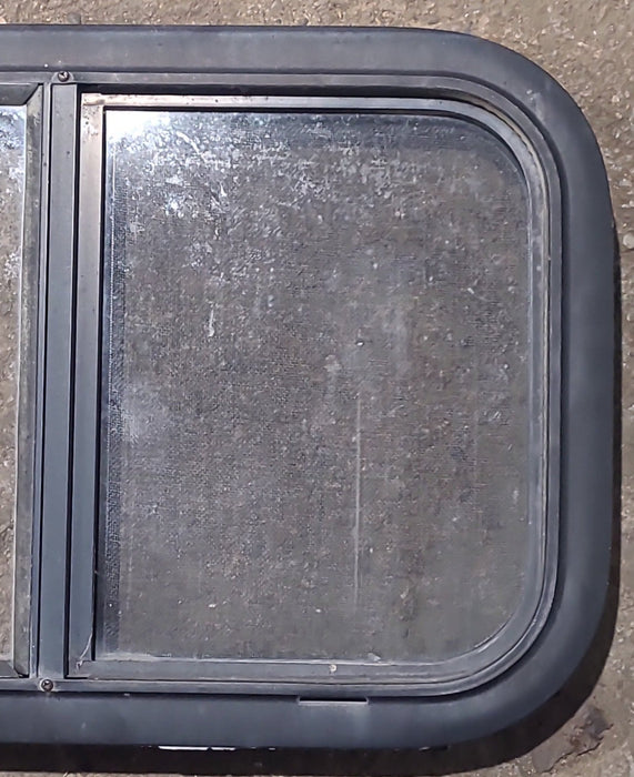 Used Black Radius Opening Window : 23 1/2" W x 14 1/2" H x 1 5/8" D