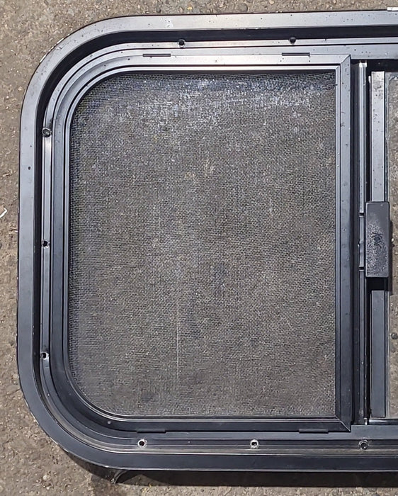 Used Black Radius Opening Window : 23 1/2" W x 14 1/2" H x 1 5/8" D