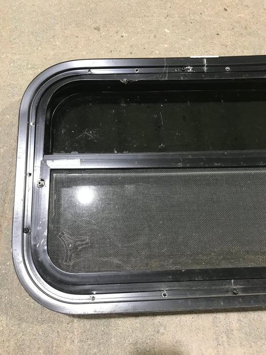 Used Black Radius Opening Window : 23 1/2" W x 14 1/2" H x 1 7/8"