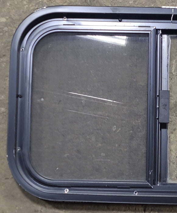 Used Black Radius Opening Window : 23 1/2" W x 14 1/2" H x 1 7/8" D