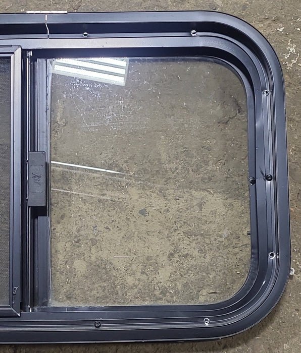 Used Black Radius Opening Window : 23 1/2" W x 14 1/2" H x 1 7/8" D