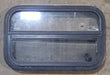 Used Black Radius Opening Window : 23 1/2" W x 14 1/2" H x 2" D - Young Farts RV Parts