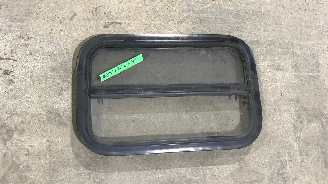Used Black Radius Opening Window : 23 1/2" W X 14 1/2" H X 2" D