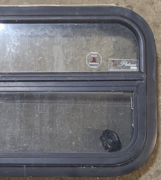 Used Black Radius Opening Window : 23 1/2" W x 14 1/2" H x 2" D