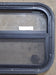 Used Black Radius Opening Window : 23 1/2" W x 14 1/4" H x 1 7/8" D - Young Farts RV Parts