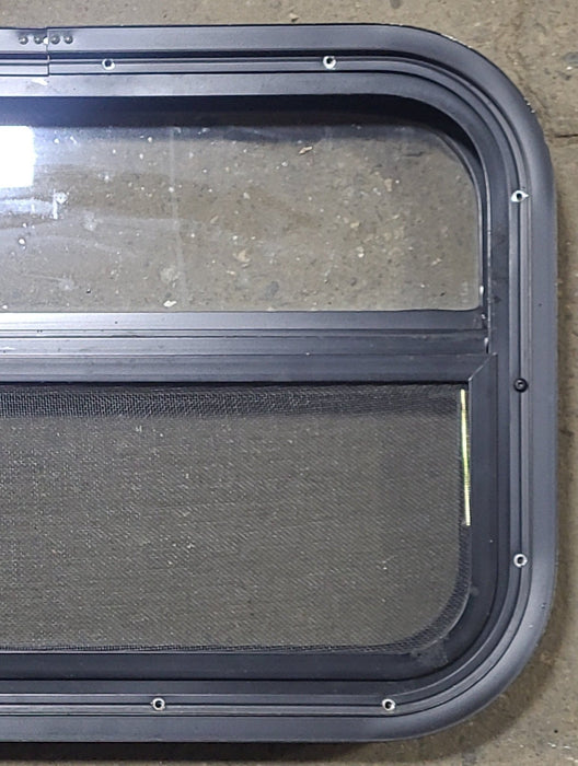 Used Black Radius Opening Window : 23 1/2" W x 14 1/4" H x 2" D