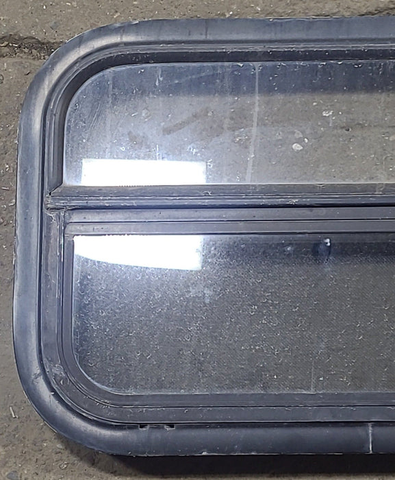 Used Black Radius Opening Window : 23 1/2" W x 14 1/4" H x 2" D