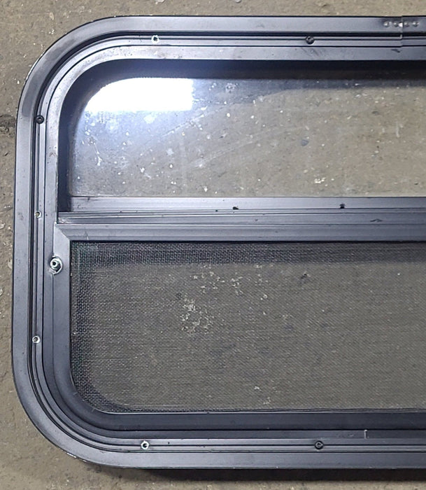 Used Black Radius Opening Window : 23 1/2" W x 14 1/4" H x 2" D