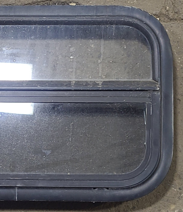 Used Black Radius Opening Window : 23 1/2" W x 14 1/4" H x 2" D