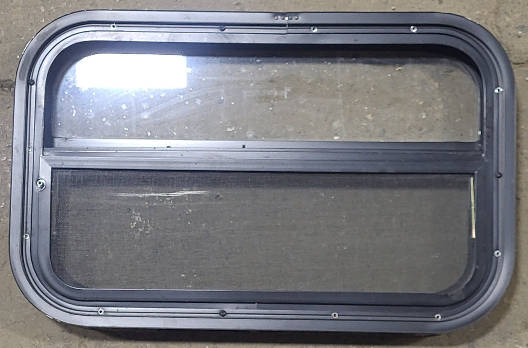 Used Black Radius Opening Window : 23 1/2" W x 14 1/4" H x 2" D - Young Farts RV Parts