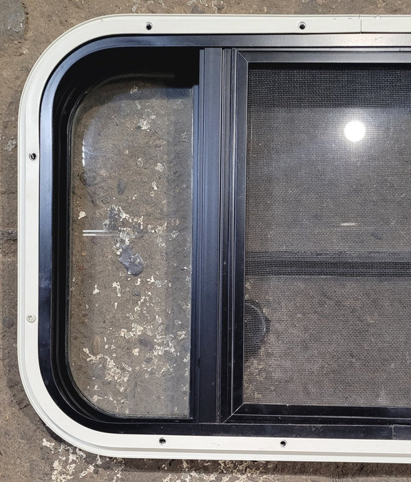 Used Black Radius Opening Window : 23 1/2" W x 14 3/4" H x 1 1/4" D