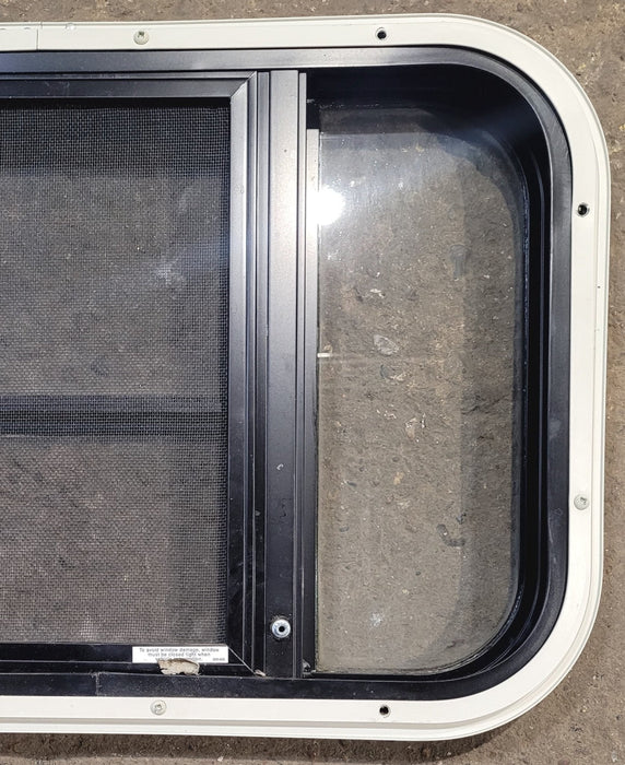 Used Black Radius Opening Window : 23 1/2" W x 14 3/4" H x 1 1/4" D