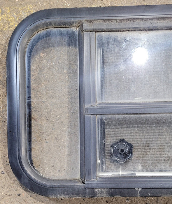 Used Black Radius Opening Window : 23 1/2" W x 14 3/4" H x 1 1/4" D