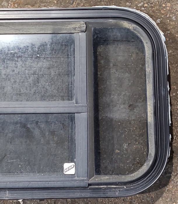 Used Black Radius Opening Window : 23 1/2" W x 14 5/8" H x 1 3/4" D