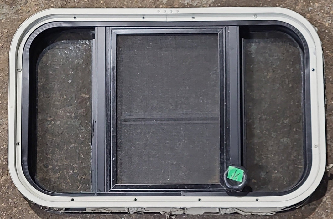 Used Black Radius Opening Window : 23 1/2" W x 14 5/8" H x 1 3/4" D