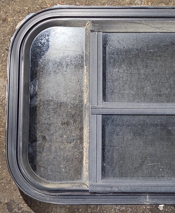 Used Black Radius Opening Window : 23 1/2" W x 14 5/8" H x 1 3/4" D