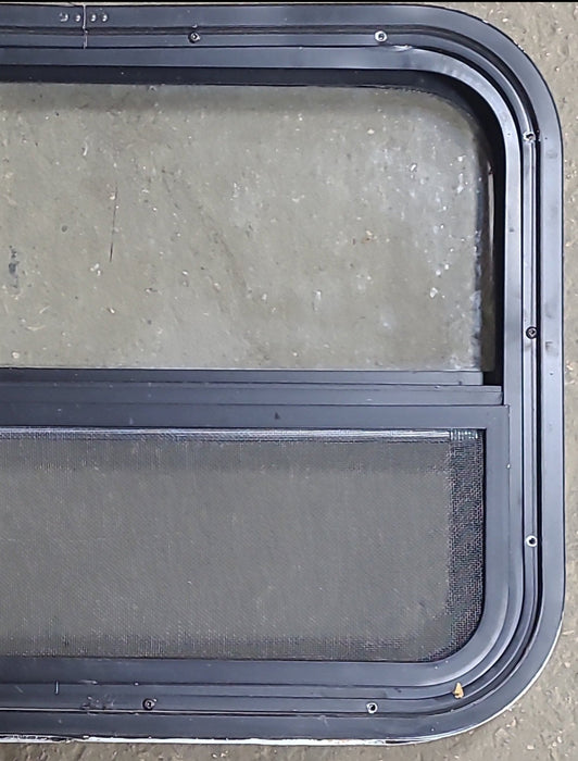 Used Black Radius Opening Window : 23 1/2" W x 17 1/2" H x 1 3/4" D