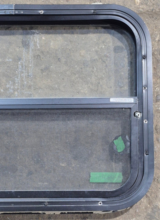 Used Black Radius Opening Window : 23 1/2" W x 17 1/4" H x 1 7/8" D