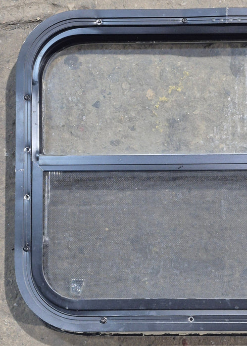 Used Black Radius Opening Window : 23 1/2" W x 17 1/4" H x 1 7/8" D