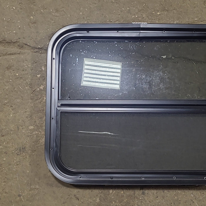Used Black Radius Opening Window : 23 1/2" W x 19 1/2" H x 1 3/4" D