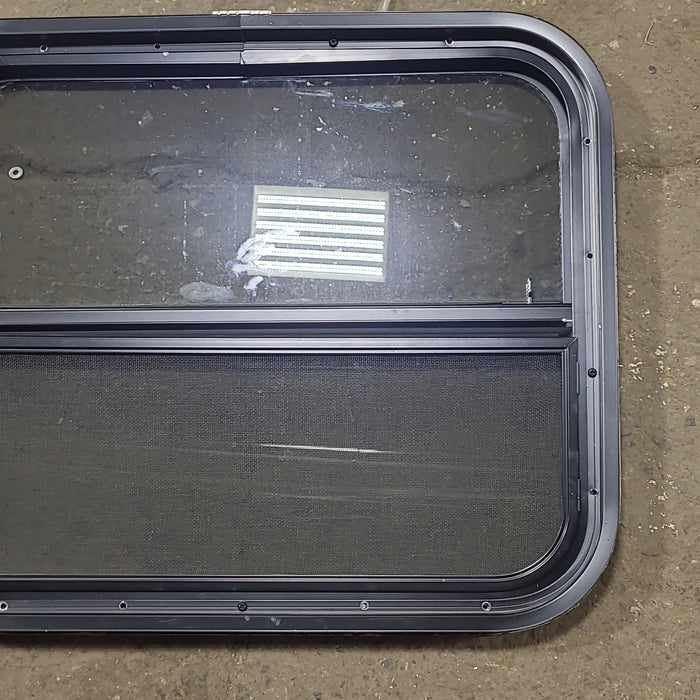 Used Black Radius Opening Window : 23 1/2" W x 19 1/2" H x 1 3/4" D
