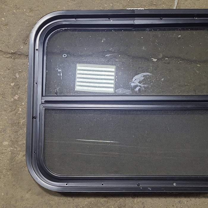 Used Black Radius Opening Window : 23 1/2" W x 19 1/2" H x 1 3/4" D