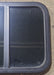 Used Black Radius Opening Window : 23 1/2" W x 19 1/2" H x 1 5/8" D - Young Farts RV Parts