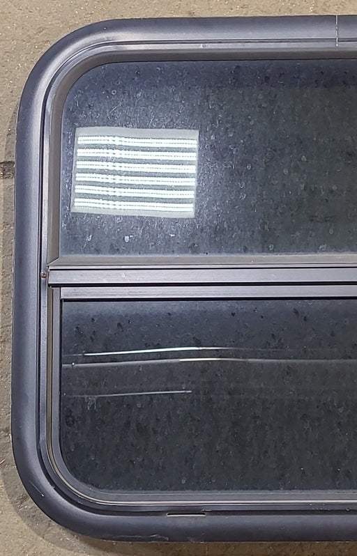 Used Black Radius Opening Window : 23 1/2" W x 19 1/2" H x 1 7/8" D - Young Farts RV Parts