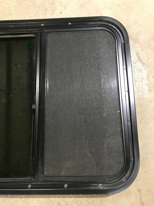 Used Black Radius Opening Window : 23 1/2" W x 21 1/2" H x 1 7/8" D