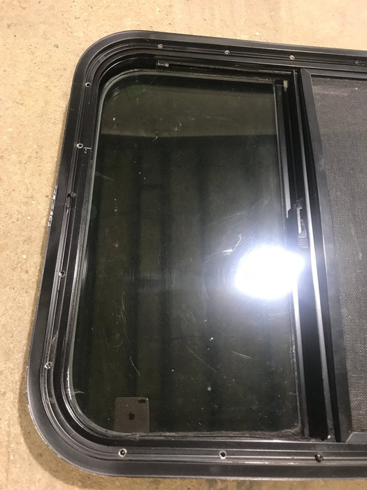 Used Black Radius Opening Window : 23 1/2" W x 21 1/2" H x 1 7/8" D