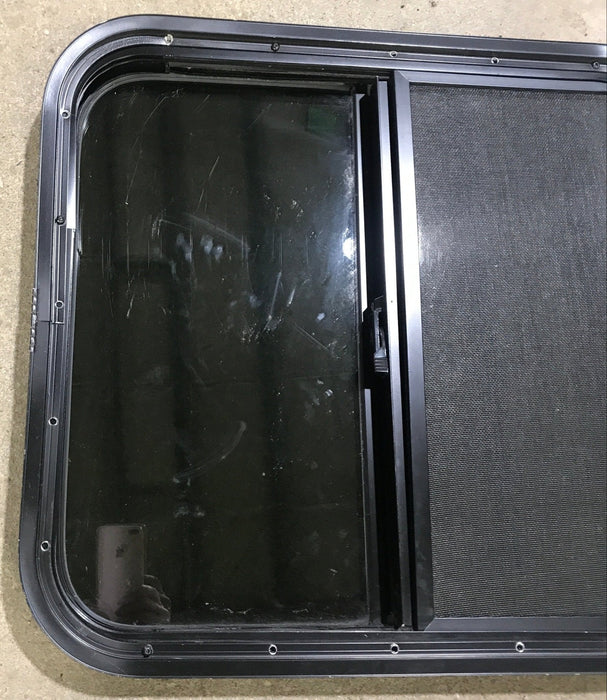 Used Black Radius Opening Window : 23 1/2" W x 21 1/2" H x 1 7/8" D