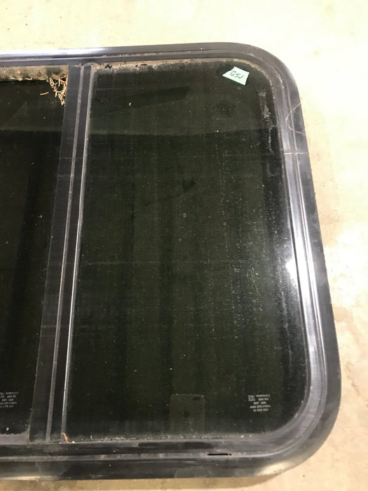 Used Black Radius Opening Window : 23 1/2" W x 21 1/2" H x 1 7/8" D