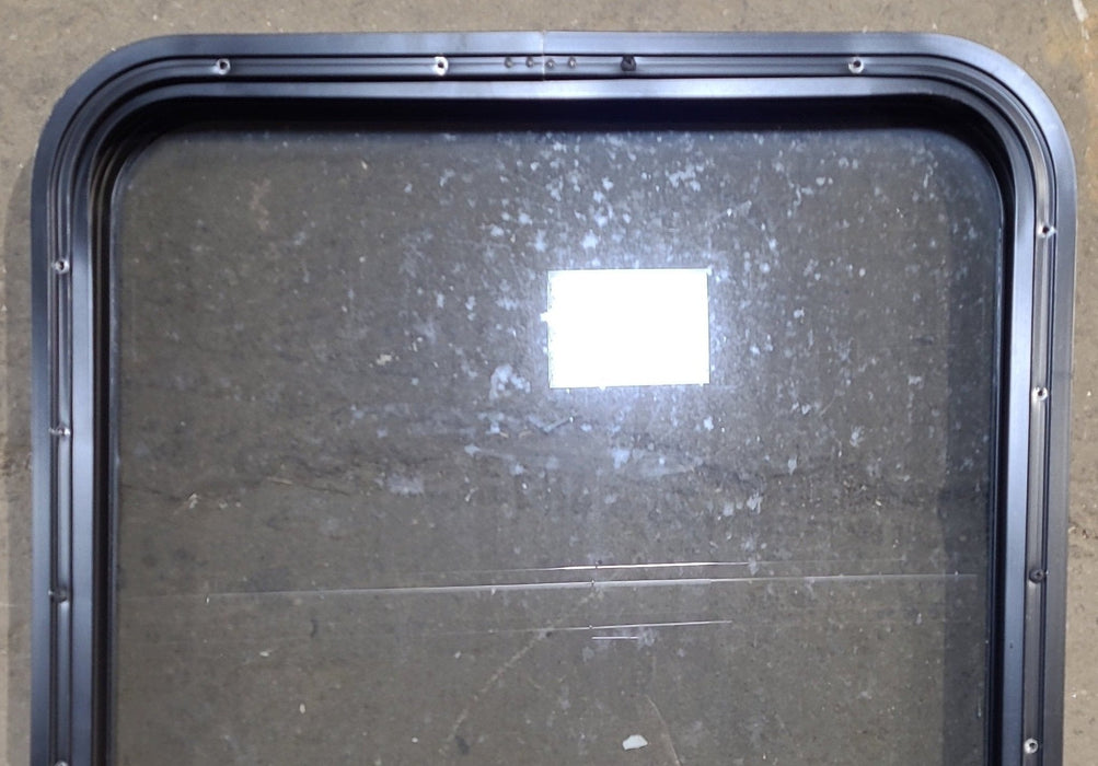 Used Black Radius Non Opening Window : 23 1/2" W x 28 3/4" H x 1 3/4" D