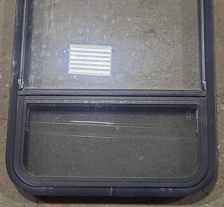 Used Black Radius Opening Window : 23 1/2" W x 39 1/2" H x 1 7/8" D - Young Farts RV Parts