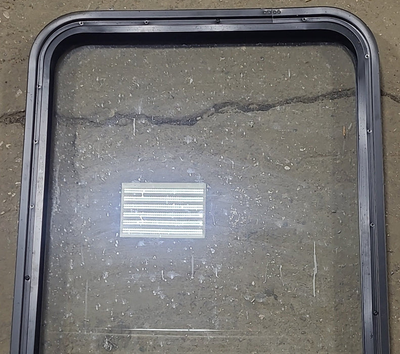 Used Black Radius Opening Window : 23 1/2" W x 39 1/2" H x 1 7/8" D - Young Farts RV Parts