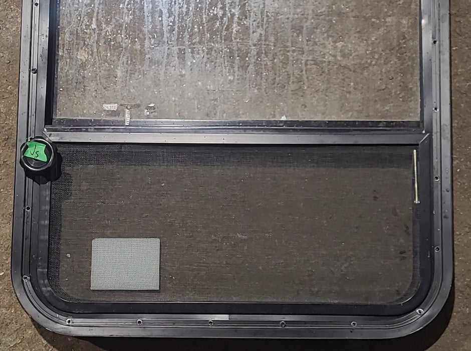 Used Black Radius Opening Window : 23 1/2" W x 39 1/4" H x 1 7/8" D