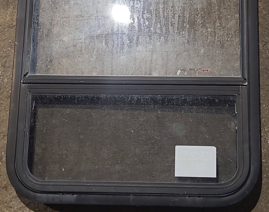 Used Black Radius Opening Window : 23 1/2" W x 39 1/4" H x 1 7/8" D