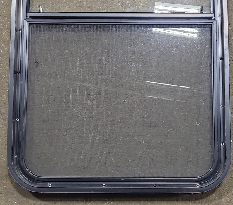Used Black Radius Opening Window : 23 1/2" W x 39 1/4" H x 2" D - Young Farts RV Parts