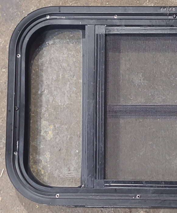 Used Black Radius Opening Window : 23 1/4" W x 15 1/4" H x 1 7/8" D