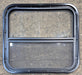 Used Black Radius Opening Window : 23 1/4" W x 21 1/4" H x 1 1/2" - Young Farts RV Parts