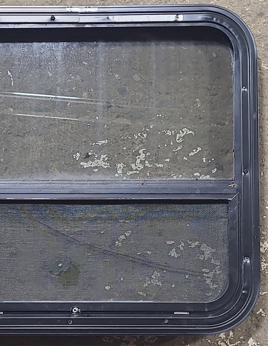 Used Black Radius Opening Window : 23 1/4" W x 21 1/4" H x 1 7/8" D