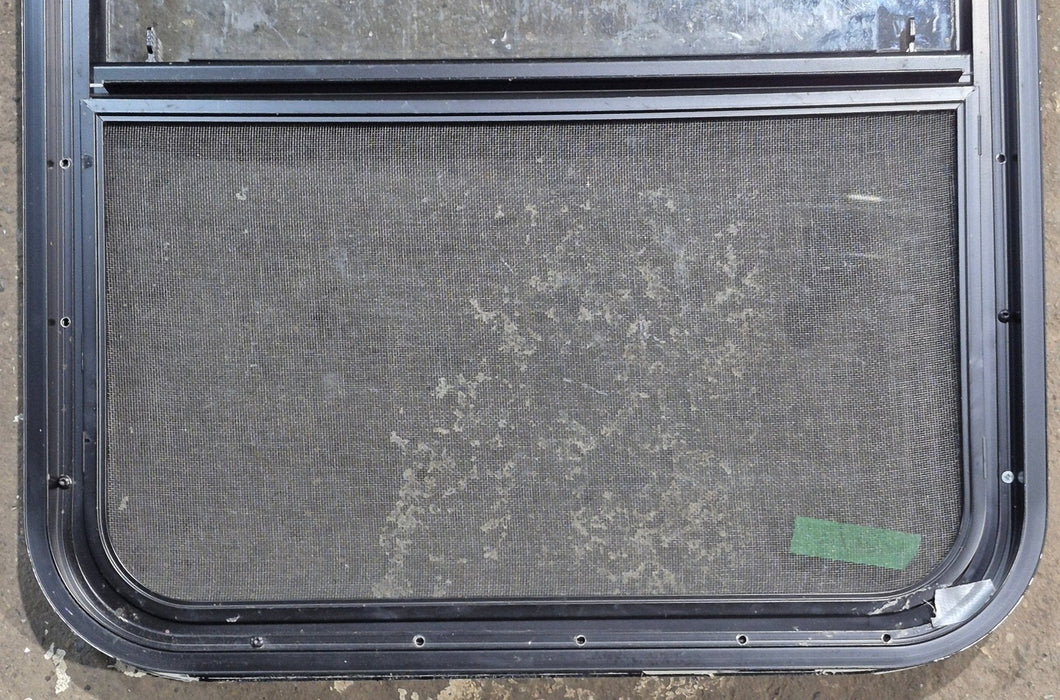Used Black Radius Opening Window : 23 1/4" W x 28 1/4" H x 1 3/4" D - Young Farts RV Parts