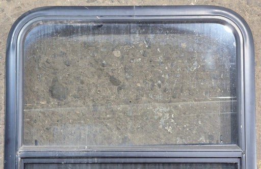 Used Black Radius Opening Window : 23 1/4" W x 28 1/4" H x 1 3/4" D - Young Farts RV Parts