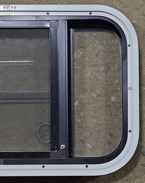 Used Black Radius Opening Window : 23 3/8" W x 14 3/8" H x 1 3/4" D