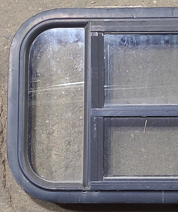 Used Black Radius Opening Window : 23 3/8" W x 14 3/8" H x 1 3/4" D