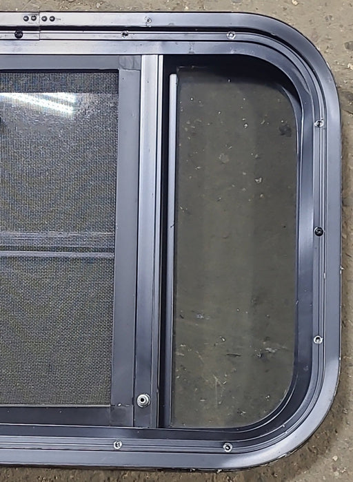 Used Black Radius Opening Window : 23 3/8" W x 15 1/2" H x 1 7/8" D