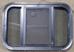 Used Black Radius Opening Window : 23 3/8" W x 15 1/2" H x 1 7/8" D - Young Farts RV Parts